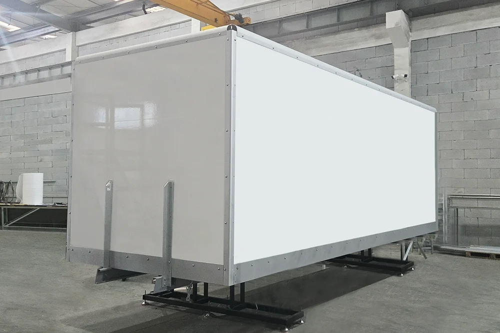 Refrigerated truck bodies lined up in the configuration facility